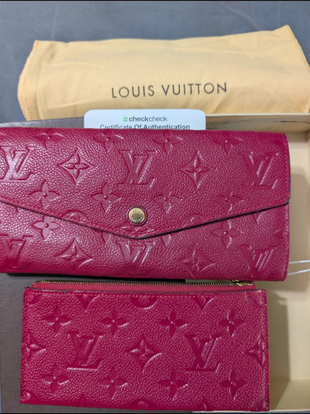 Louis Vuitton Monogram Empreinte Curieuse Long Wallet with Removable Zip Pouch.